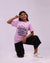 Close-up of affirmation text print on lilac kids tee—clear message, soft fabric detail
