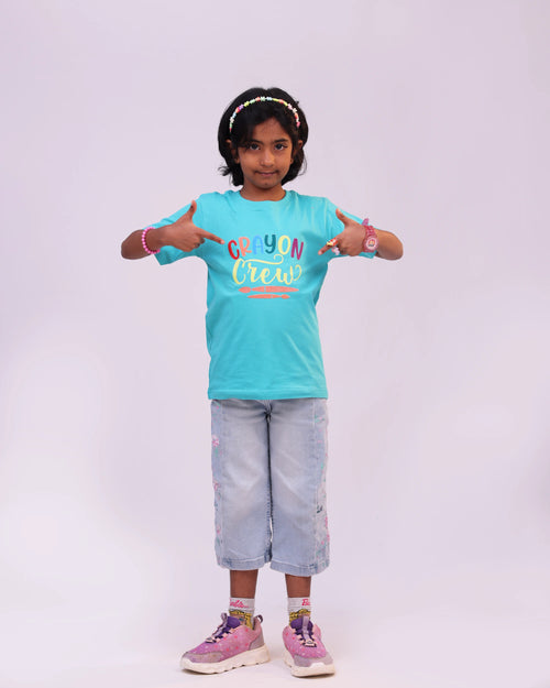 Side profile of “Crayon Crew” tee – relaxed fit with cheerful, colorful design