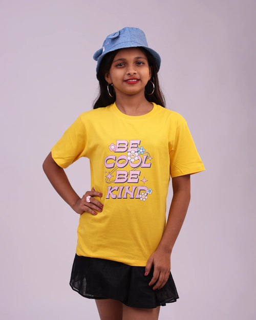 Side profile of “Be Cool Be Kind” tee – cheerful design and comfy fit