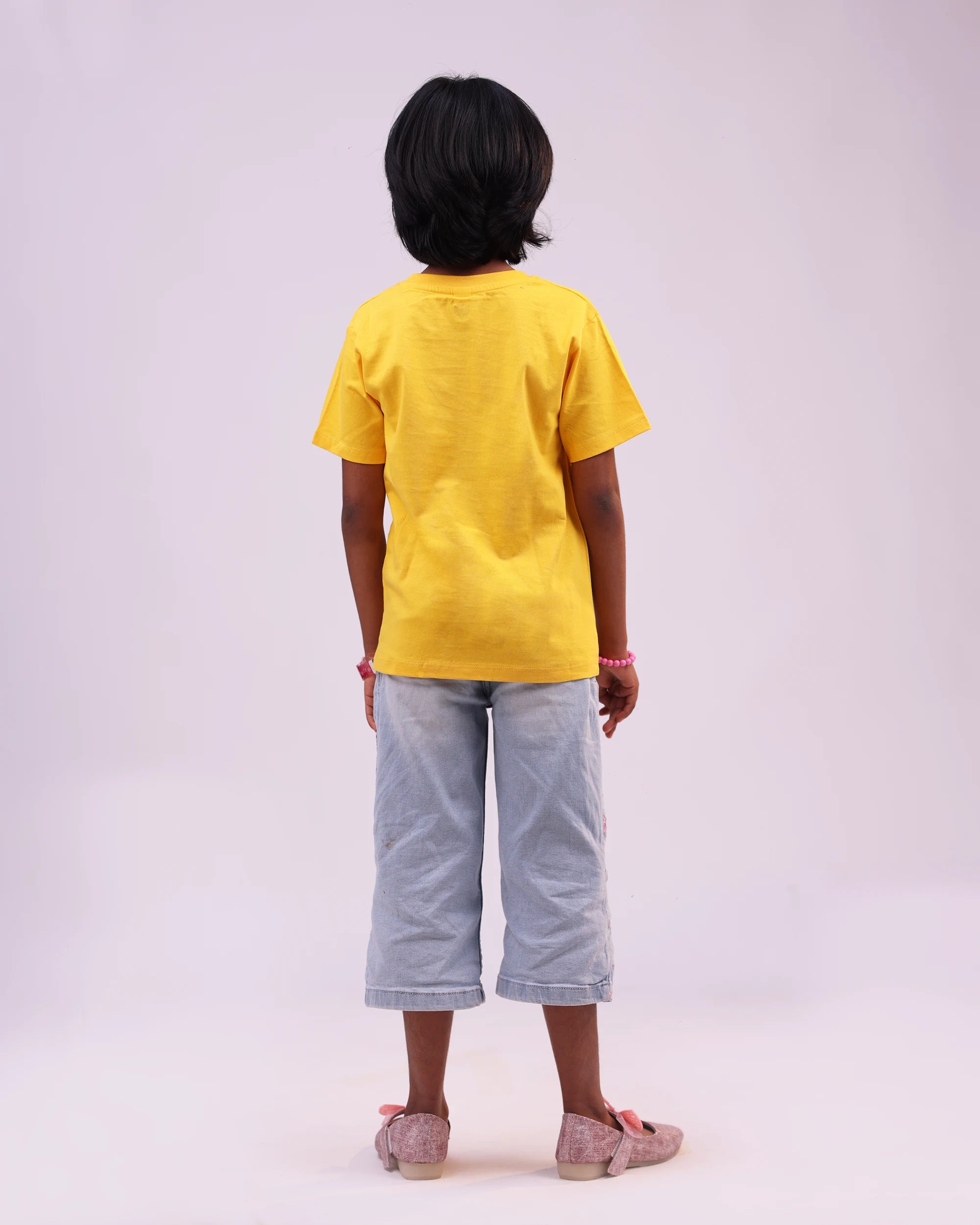 Back view of “Cool Kids” unisex tee—clean silhouette, comfy feel