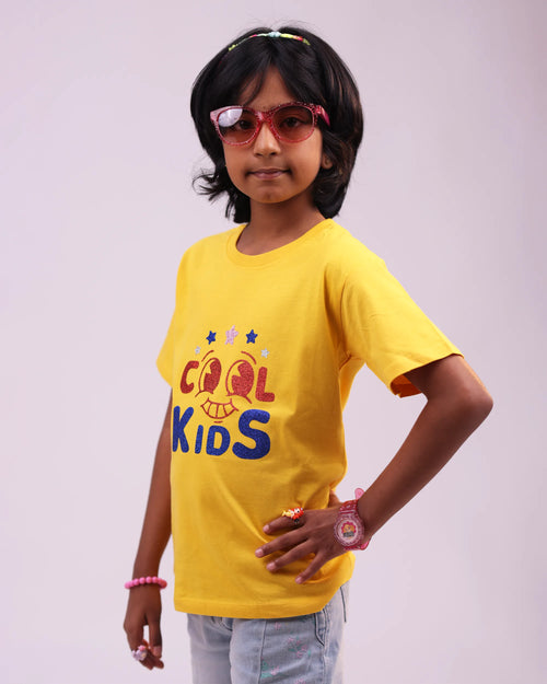 Side profile of “Cool Kids” tee—relaxed fit and bright style